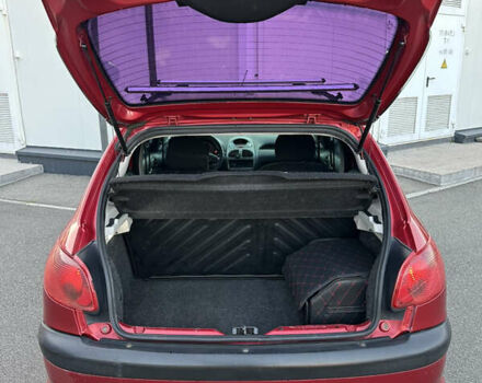 Красный Пежо 206, объемом двигателя 1.4 л и пробегом 263 тыс. км за 2600 $, фото 14 на Automoto.ua