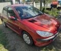 Красный Пежо 206, объемом двигателя 1.36 л и пробегом 133 тыс. км за 4200 $, фото 6 на Automoto.ua