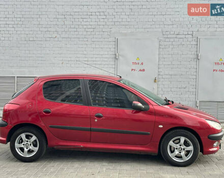 Червоний Пежо 206, об'ємом двигуна 1.59 л та пробігом 195 тис. км за 3800 $, фото 3 на Automoto.ua