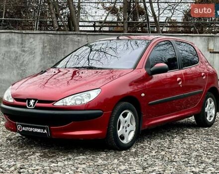 Красный Пежо 206, объемом двигателя 1.36 л и пробегом 232 тыс. км за 2990 $, фото 3 на Automoto.ua