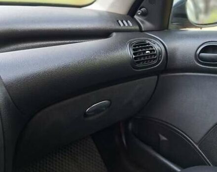 Красный Пежо 206, объемом двигателя 1.4 л и пробегом 199 тыс. км за 3900 $, фото 11 на Automoto.ua