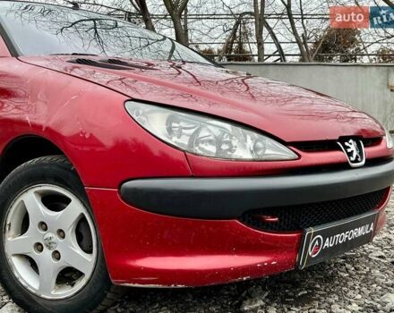 Красный Пежо 206, объемом двигателя 1.36 л и пробегом 232 тыс. км за 2990 $, фото 1 на Automoto.ua
