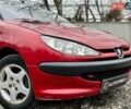 Красный Пежо 206, объемом двигателя 1.36 л и пробегом 232 тыс. км за 2990 $, фото 1 на Automoto.ua