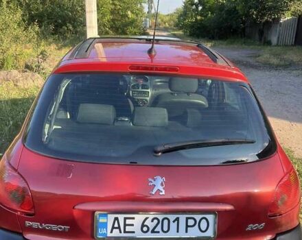 Красный Пежо 206, объемом двигателя 1.36 л и пробегом 280 тыс. км за 3200 $, фото 11 на Automoto.ua