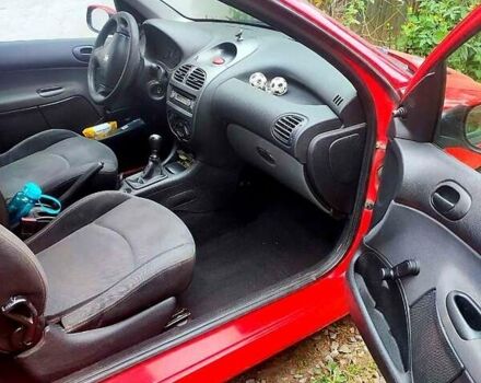 Красный Пежо 206, объемом двигателя 1.4 л и пробегом 211 тыс. км за 3000 $, фото 7 на Automoto.ua