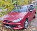 Красный Пежо 206, объемом двигателя 1.4 л и пробегом 199 тыс. км за 3900 $, фото 1 на Automoto.ua