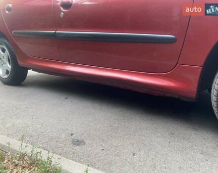 Красный Пежо 206, объемом двигателя 1.4 л и пробегом 221 тыс. км за 3300 $, фото 9 на Automoto.ua