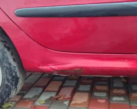 Червоний Пежо 206, об'ємом двигуна 1.4 л та пробігом 204 тис. км за 2850 $, фото 10 на Automoto.ua