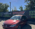 Красный Пежо 206, объемом двигателя 1.59 л и пробегом 274 тыс. км за 3299 $, фото 1 на Automoto.ua