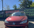 Красный Пежо 206, объемом двигателя 1.59 л и пробегом 274 тыс. км за 3299 $, фото 2 на Automoto.ua