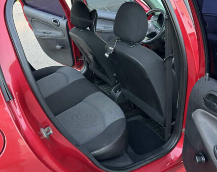 Красный Пежо 206, объемом двигателя 1.4 л и пробегом 263 тыс. км за 2600 $, фото 16 на Automoto.ua