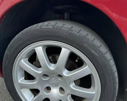 Красный Пежо 206, объемом двигателя 1.4 л и пробегом 263 тыс. км за 2600 $, фото 24 на Automoto.ua