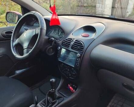 Червоний Пежо 206, об'ємом двигуна 1.4 л та пробігом 204 тис. км за 2850 $, фото 8 на Automoto.ua