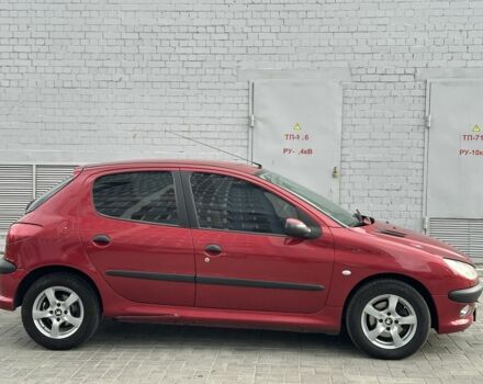 Красный Пежо 206, объемом двигателя 1.6 л и пробегом 195 тыс. км за 3750 $, фото 3 на Automoto.ua