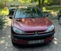 Красный Пежо 206, объемом двигателя 1.4 л и пробегом 173 тыс. км за 2008 $, фото 1 на Automoto.ua