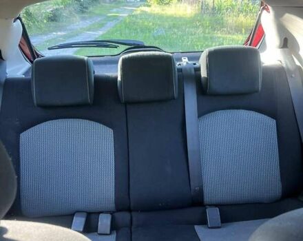 Красный Пежо 206, объемом двигателя 1.36 л и пробегом 280 тыс. км за 3200 $, фото 5 на Automoto.ua