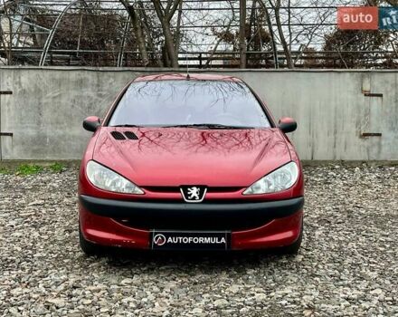Красный Пежо 206, объемом двигателя 1.36 л и пробегом 232 тыс. км за 2990 $, фото 2 на Automoto.ua