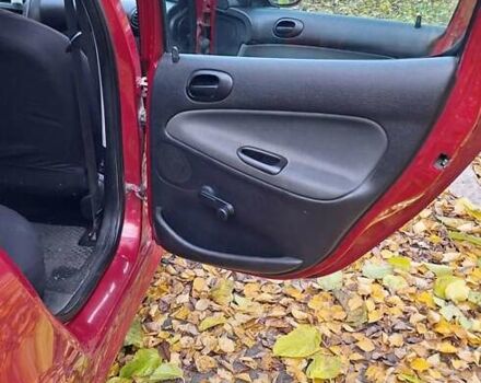 Красный Пежо 206, объемом двигателя 1.4 л и пробегом 199 тыс. км за 3900 $, фото 8 на Automoto.ua