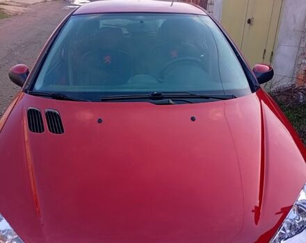 Червоний Пежо 206, об'ємом двигуна 1.4 л та пробігом 167 тис. км за 3300 $, фото 2 на Automoto.ua