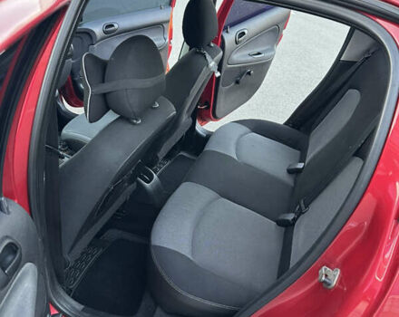 Красный Пежо 206, объемом двигателя 1.4 л и пробегом 263 тыс. км за 2600 $, фото 15 на Automoto.ua