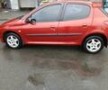 Красный Пежо 206, объемом двигателя 1.4 л и пробегом 231 тыс. км за 3400 $, фото 1 на Automoto.ua