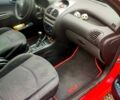 Червоний Пежо 206, об'ємом двигуна 1.4 л та пробігом 211 тис. км за 3000 $, фото 5 на Automoto.ua