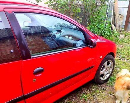 Червоний Пежо 206, об'ємом двигуна 1.4 л та пробігом 211 тис. км за 3000 $, фото 3 на Automoto.ua