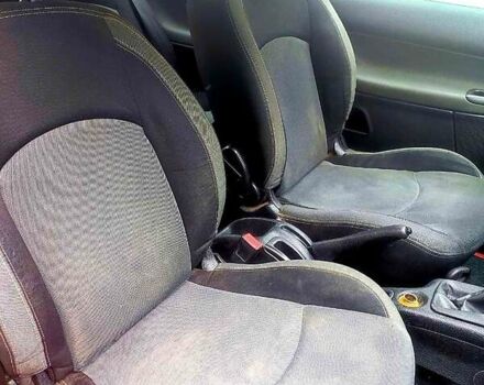 Красный Пежо 206, объемом двигателя 1.4 л и пробегом 211 тыс. км за 3000 $, фото 3 на Automoto.ua