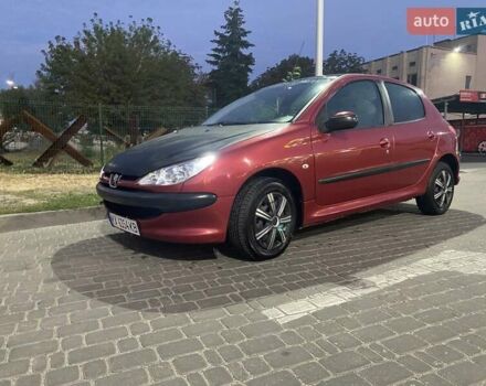 Красный Пежо 206, объемом двигателя 1.4 л и пробегом 221 тыс. км за 3300 $, фото 3 на Automoto.ua