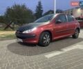 Красный Пежо 206, объемом двигателя 1.4 л и пробегом 221 тыс. км за 3300 $, фото 3 на Automoto.ua