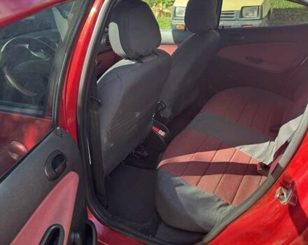 Красный Пежо 206, объемом двигателя 1.36 л и пробегом 133 тыс. км за 4200 $, фото 4 на Automoto.ua