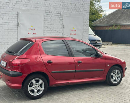 Червоний Пежо 206, об'ємом двигуна 1.59 л та пробігом 195 тис. км за 3800 $, фото 4 на Automoto.ua