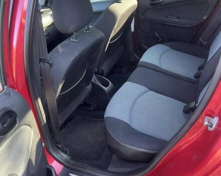 Красный Пежо 206, объемом двигателя 1.36 л и пробегом 280 тыс. км за 3200 $, фото 10 на Automoto.ua