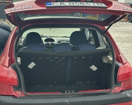 Красный Пежо 206, объемом двигателя 1.6 л и пробегом 195 тыс. км за 3750 $, фото 22 на Automoto.ua