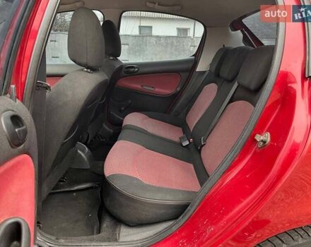 Красный Пежо 206, объемом двигателя 1.36 л и пробегом 232 тыс. км за 2990 $, фото 8 на Automoto.ua