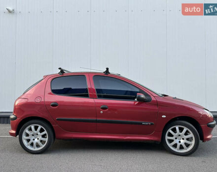 Красный Пежо 206, объемом двигателя 1.4 л и пробегом 263 тыс. км за 2600 $, фото 3 на Automoto.ua