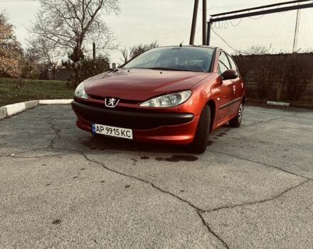 Красный Пежо 206, объемом двигателя 1.4 л и пробегом 241 тыс. км за 3200 $, фото 1 на Automoto.ua