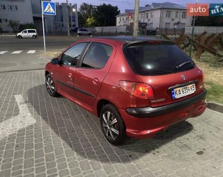 Красный Пежо 206, объемом двигателя 1.4 л и пробегом 221 тыс. км за 3300 $, фото 13 на Automoto.ua