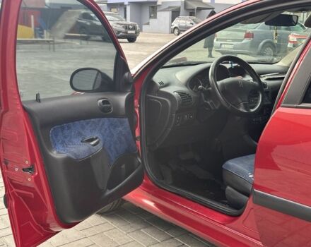 Красный Пежо 206, объемом двигателя 1.6 л и пробегом 195 тыс. км за 3750 $, фото 14 на Automoto.ua