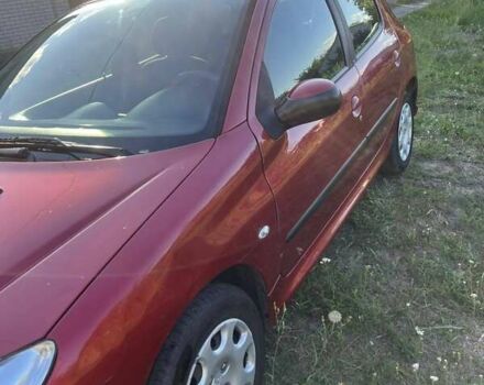 Красный Пежо 206, объемом двигателя 1.36 л и пробегом 280 тыс. км за 3200 $, фото 13 на Automoto.ua