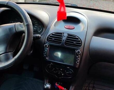 Червоний Пежо 206, об'ємом двигуна 1.4 л та пробігом 204 тис. км за 2850 $, фото 7 на Automoto.ua