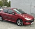 Красный Пежо 206, объемом двигателя 1.6 л и пробегом 195 тыс. км за 3750 $, фото 2 на Automoto.ua