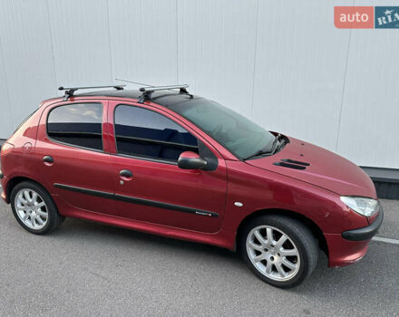 Красный Пежо 206, объемом двигателя 1.4 л и пробегом 263 тыс. км за 2600 $, фото 5 на Automoto.ua