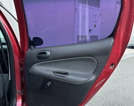 Красный Пежо 206, объемом двигателя 1.4 л и пробегом 263 тыс. км за 2600 $, фото 22 на Automoto.ua