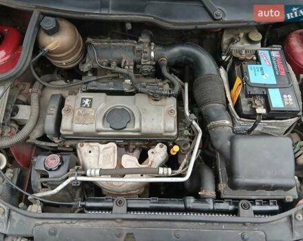 Красный Пежо 206, объемом двигателя 1.4 л и пробегом 231 тыс. км за 3400 $, фото 8 на Automoto.ua