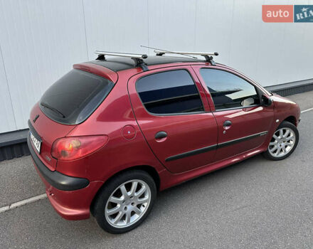 Красный Пежо 206, объемом двигателя 1.4 л и пробегом 263 тыс. км за 2600 $, фото 4 на Automoto.ua