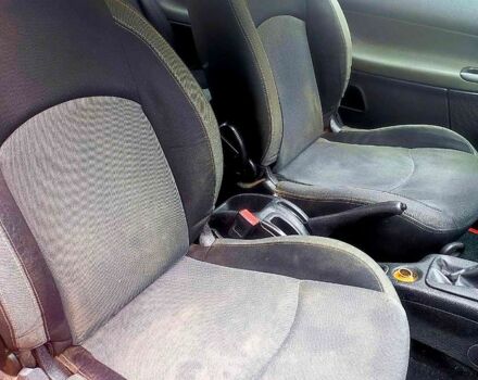 Червоний Пежо 206, об'ємом двигуна 1.4 л та пробігом 211 тис. км за 3000 $, фото 4 на Automoto.ua