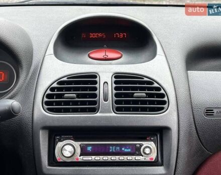 Красный Пежо 206, объемом двигателя 1.36 л и пробегом 232 тыс. км за 2990 $, фото 17 на Automoto.ua