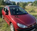 Красный Пежо 206, объемом двигателя 1.36 л и пробегом 280 тыс. км за 3200 $, фото 1 на Automoto.ua