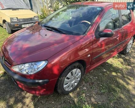 Красный Пежо 206, объемом двигателя 1.36 л и пробегом 133 тыс. км за 4200 $, фото 7 на Automoto.ua